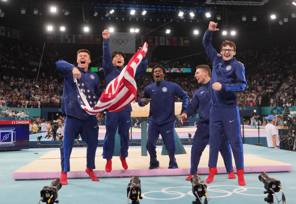 Stephen Nedoroscik, ⁣right, celebrates winning a bronze medal⁢ with teammates ‍Brody Malone,‍ Asher Hong, Frederick Richard and⁤ Paul Juda (James Lang/Reuters)