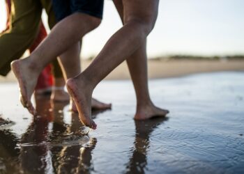 A walk on the beach after a pedicure could expose you to infections