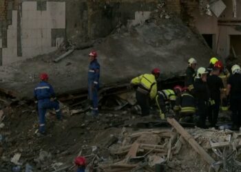 Rains wash out a highway in China's Tibet region, stranding 130 people