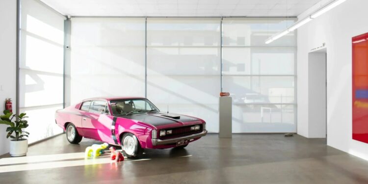 Scott Redford, 'Auto Rothkos', installation view at NAP Contemporary in Mildura, one of the new regional galleries. A minimalistic space with a hot pink care to the left hand side.