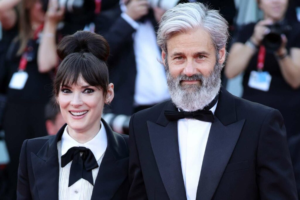 Winona Ryder and Boyfriend Scott Mackinlay Hahn Hold Hands at Venice Film Festival